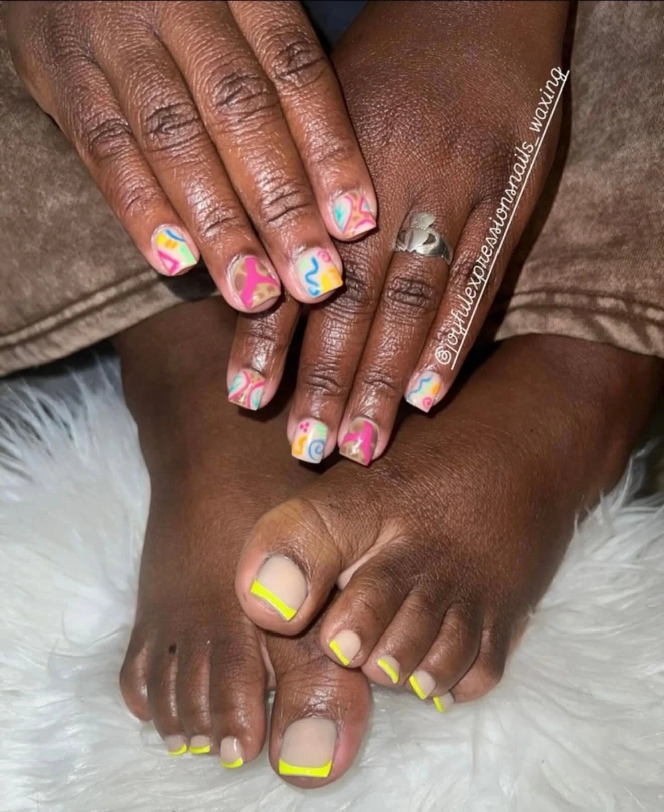 Colorful short manicure paired with neon-yellow French pedicure